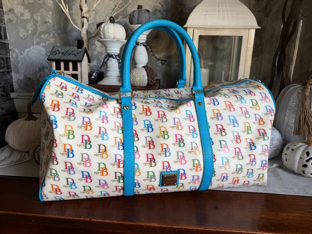 Y2K Dooney & Bourke 1975 Canvas & Leather Multi-Logo Barrel Travel Duffle Bag